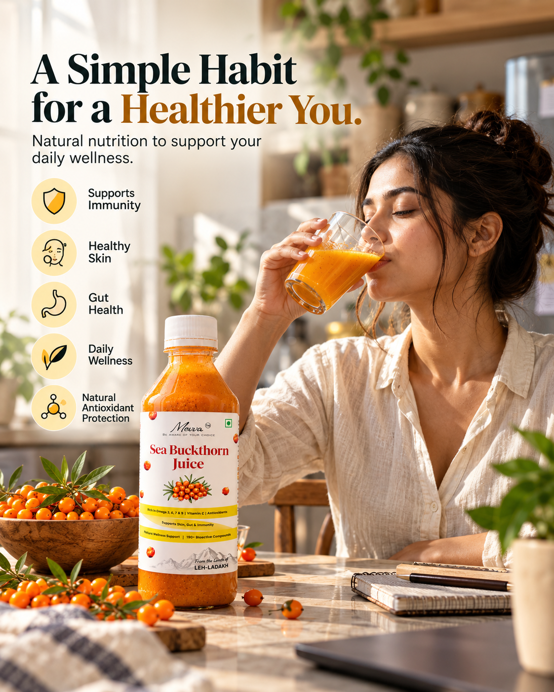 Woman drinking a glass of Mevva sea buckthorn juice at a desk, with a Mevva bottle and berries in the foreground